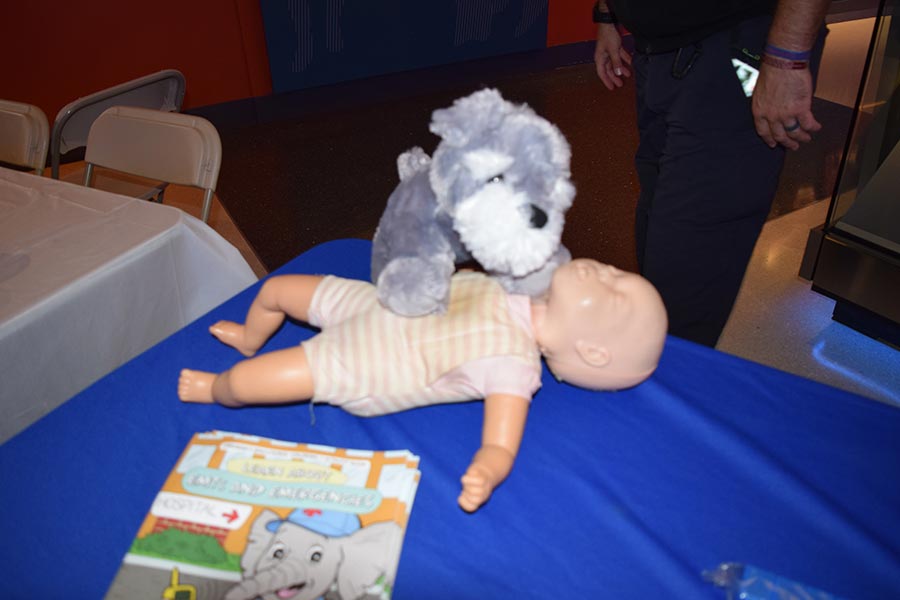 stuffed dog and child dummy at Kids Safety Expo