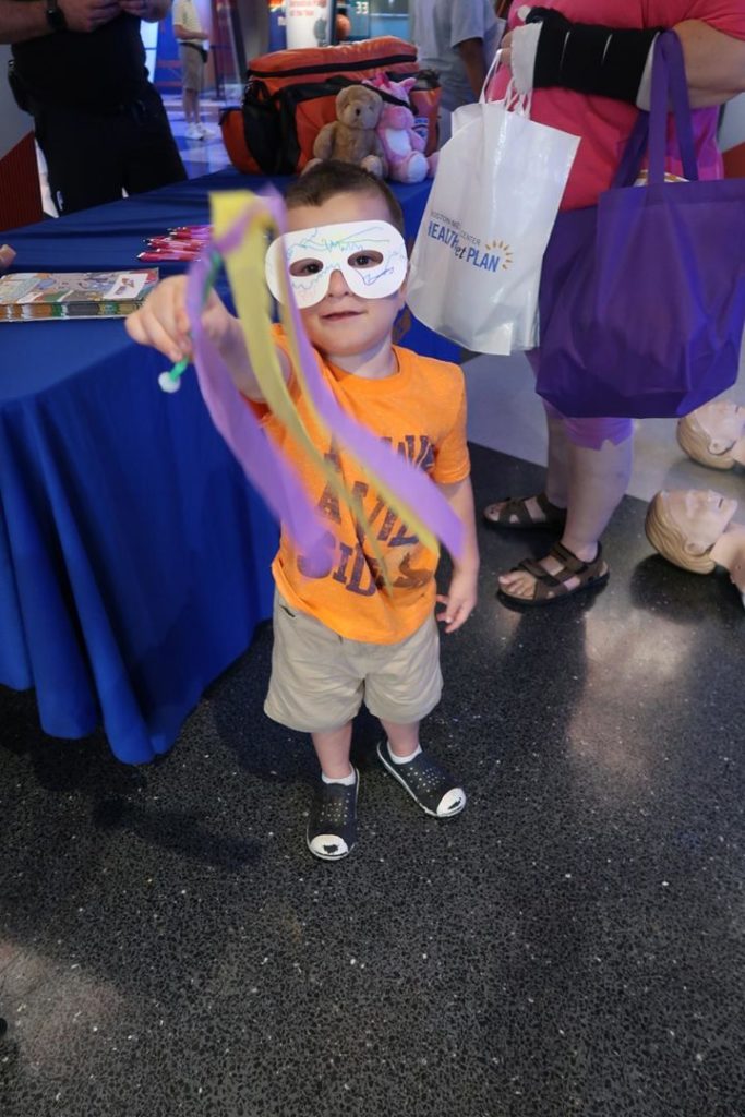 Kid in mask at Kids Safety Expo
