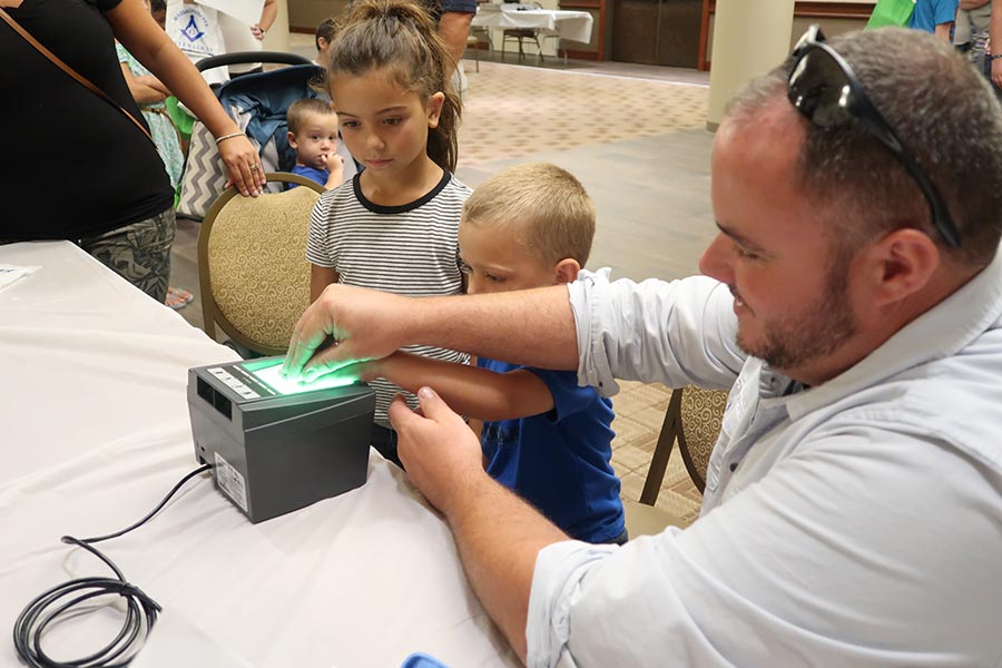 Kids fingerprinting at Kids Safety Expo