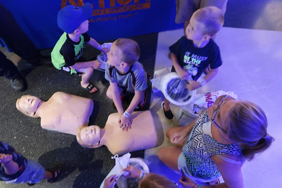 Kids with AMR dummies at Kids Safety Expo