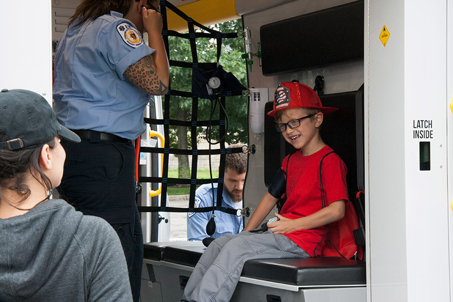 Boy in firetruck at Kids Safety Expo 2018